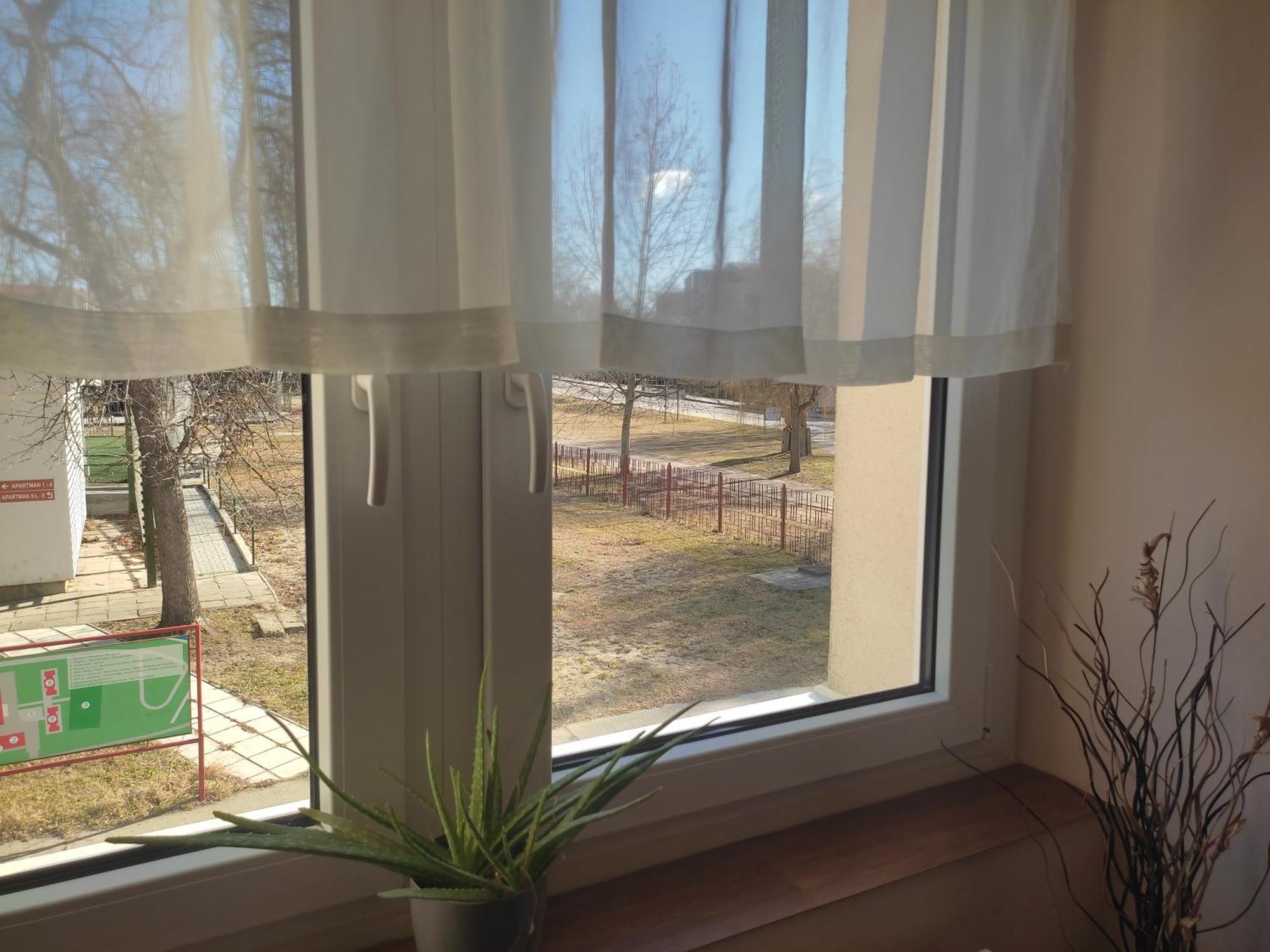 Napsugar Szallo Baja Pokoj fotografie